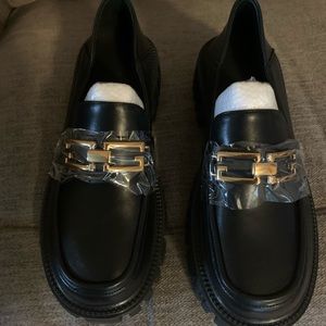 Brand New leather black with gold buckle slip on chunky shoe